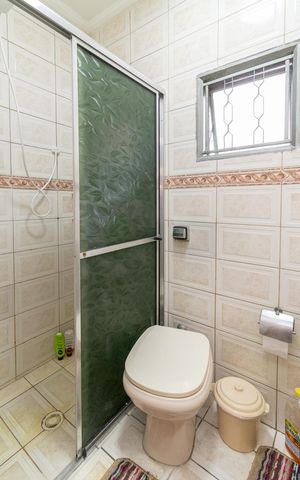 Casa à venda com 295m², 5 quartos e 1 vagaBanheiro da Suíte da Casa 01