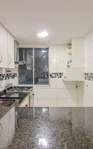 Apartamento à venda com 40m², 2 quartos e 1 vaga Apartamento à venda com 40m², 2 quartos e 1 vagaCozinha e Área de Serviço