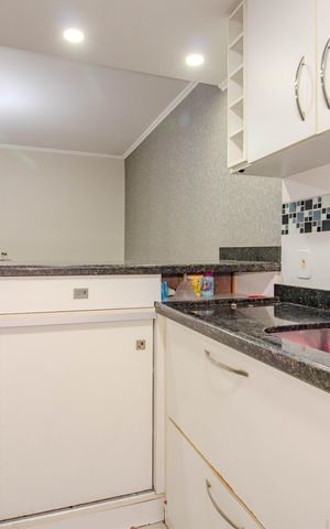 Apartamento à venda com 40m², 2 quartos e 1 vaga Apartamento à venda com 40m², 2 quartos e 1 vagaCozinha e Área de Serviço