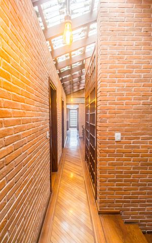 Casa à venda com 480m², 4 quartos e 4 vagasCorredor