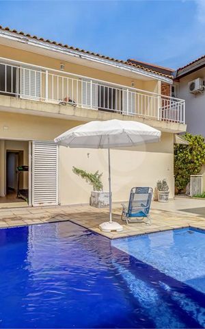 Casa de condomínio à venda com 329m², 4 quartos e 3 vagas