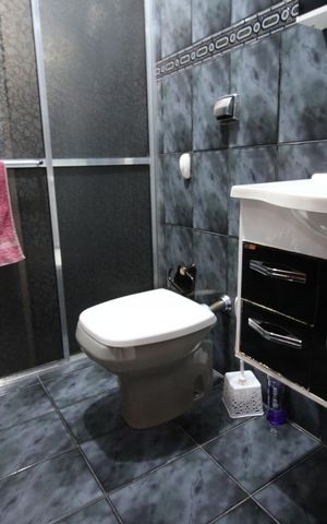 Casa à venda com 111m², 3 quartos e 6 vagasBanheiro 2