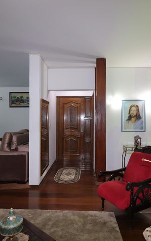 Casa à venda com 328m², 4 quartos e 4 vagasSala de Estar