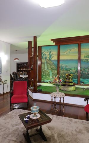 Casa à venda com 328m², 4 quartos e 4 vagasSala de Estar