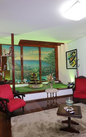Casa à venda com 328m², 4 quartos e 4 vagasSala de Estar