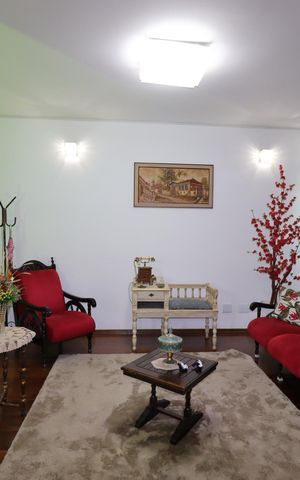 Casa à venda com 328m², 4 quartos e 4 vagasSala de Estar
