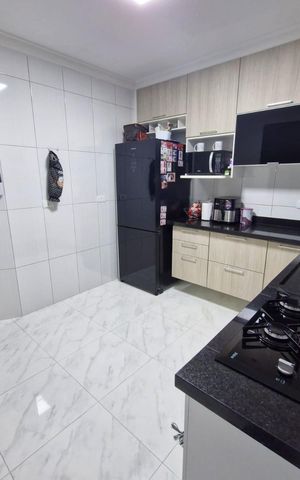 Casa à venda com 90m², 2 quartos e 2 vagas Casa à venda com 90m², 2 quartos e 2 vagasCozinha