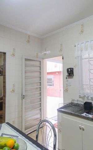 Casa à venda com 239m², 4 quartos e 4 vagas Casa à venda com 239m², 4 quartos e 4 vagasCozinha 1