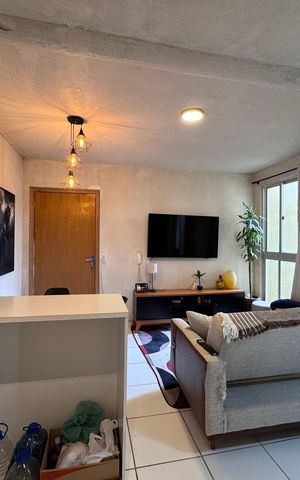 Apartamento à venda com 48m², 2 quartos e 1 vaga Apartamento à venda com 48m², 2 quartos e 1 vagaCozinha e Área de Serviço