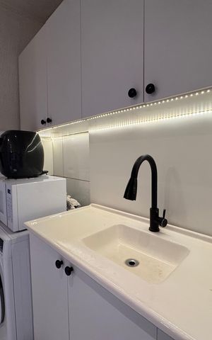 Apartamento à venda com 48m², 2 quartos e 1 vaga Apartamento à venda com 48m², 2 quartos e 1 vagaCozinha e Área de Serviço