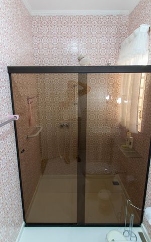 Casa à venda com 212m², 4 quartos e 2 vagasBanheiro da Suíte