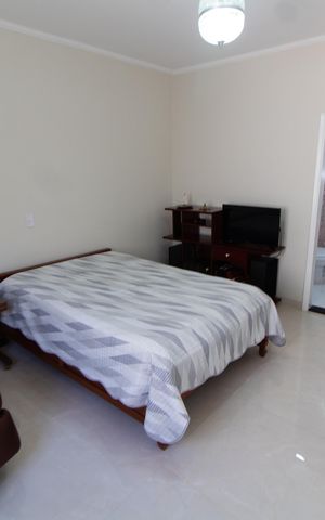 Casa à venda com 212m², 4 quartos e 2 vagasSuíte
