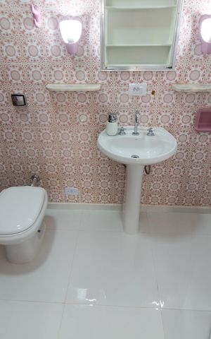 Casa à venda com 212m², 4 quartos e 2 vagasBanheiro da Suíte