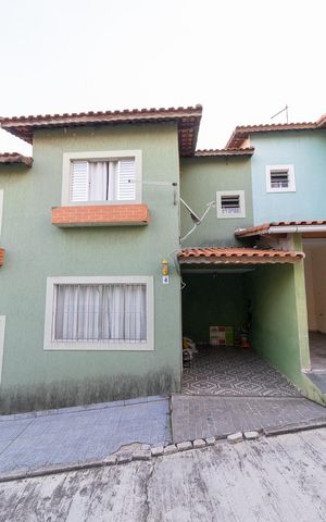 Casa de condomínio à venda com 74m², 2 quartos e 1 vagaFachada