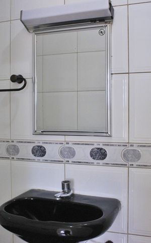 Casa à venda com 199m², 5 quartos e 1 vagaBanheiro da Suíte 2