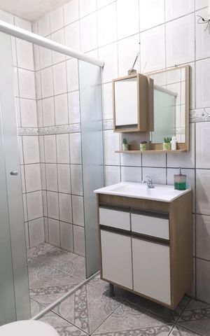 Casa à venda com 150m², 4 quartos e 2 vagasBanheiro