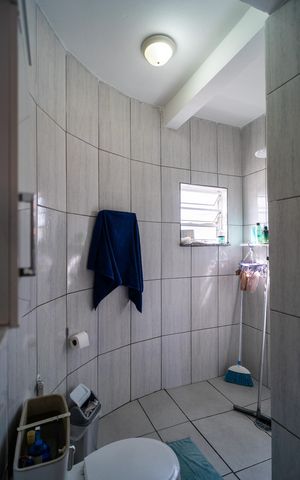 Casa para alugar com 390m², 6 quartos e 5 vagas Casa para alugar com 390m², 6 quartos e 5 vagasBanheiro da Suíte 1