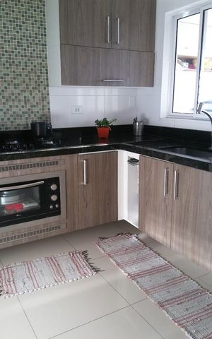 Casa à venda com 240m², 3 quartos e 3 vagas Casa à venda com 240m², 3 quartos e 3 vagasCozinha