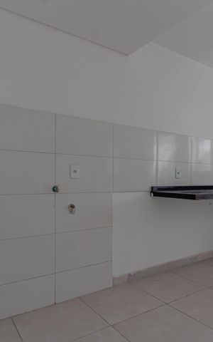 Casa à venda com 80m², 2 quartos e 2 vagas Casa à venda com 80m², 2 quartos e 2 vagasCozinha e Área de Serviço