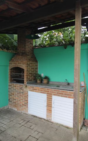 Casa de condomínio à venda com 140m², 4 quartos e sem vagaChurrasqueira