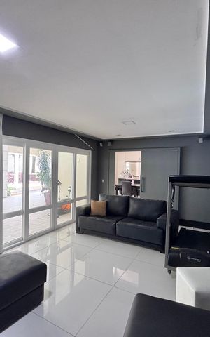 Casa à venda com 612m², 5 quartos e 4 vagasSala de TV