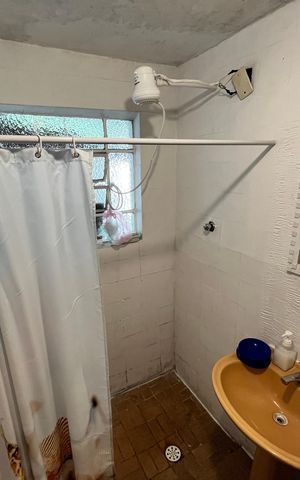 Casa à venda com 258m², 3 quartos e 2 vagasBanheiro de serviço