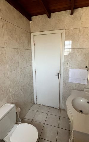Casa à venda com 258m², 3 quartos e 2 vagasBanheiro