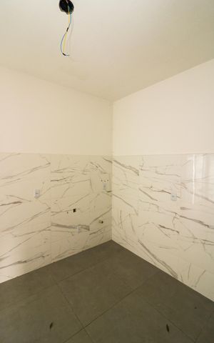 Casa de condomínio à venda com 70m², 2 quartos e 1 vaga Casa de condomínio à venda com 70m², 2 quartos e 1 vagaCozinha e Área de Serviço