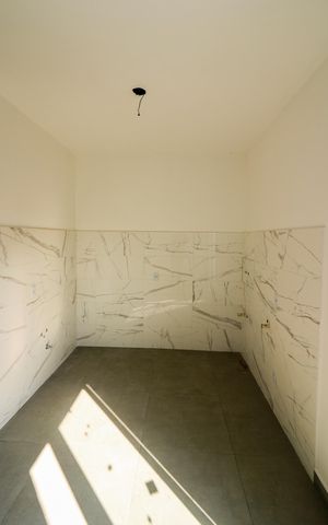 Casa de condomínio à venda com 70m², 2 quartos e 1 vaga Casa de condomínio à venda com 70m², 2 quartos e 1 vagaCozinha e Área de Serviço
