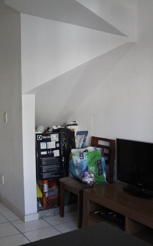 Casa de condomínio à venda com 55m², 2 quartos e 1 vagaSala