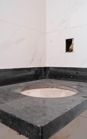 Casa à venda com 79m², 2 quartos e 2 vagasBanheiro da Suíte 1