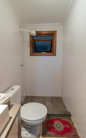 Casa de condomínio à venda com 382m², 3 quartos e 2 vagasBanheiro Social 3