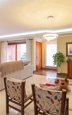 Casa de condomínio à venda com 382m², 3 quartos e 2 vagasSala