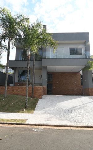 Casa de condomínio à venda com 402m², 4 quartos e 4 vagasFachada