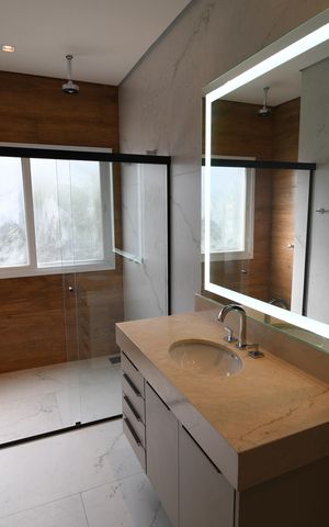 Casa de condomínio à venda com 402m², 4 quartos e 4 vagasBanheiro Quarto 2 - Suíte