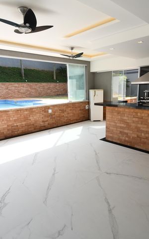 Casa de condomínio à venda com 402m², 4 quartos e 4 vagasVaranda gourmet