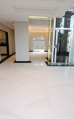 Casa de condomínio à venda com 402m², 4 quartos e 4 vagasSala 1