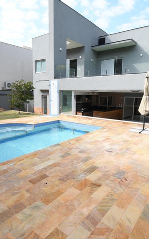 Casa de condomínio à venda com 402m², 4 quartos e 4 vagasPiscina