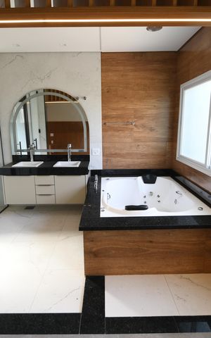 Casa de condomínio à venda com 402m², 4 quartos e 4 vagasBanheiro 1