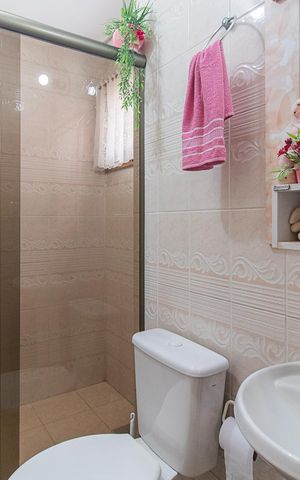 Casa de condomínio à venda com 197m², 3 quartos e 3 vagasBanheiro Social