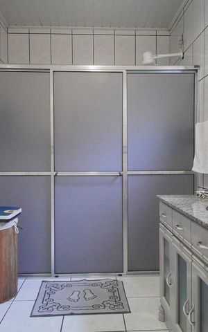 Casa à venda com 264m², 3 quartos e 3 vagasBanheiro da Suíte 1