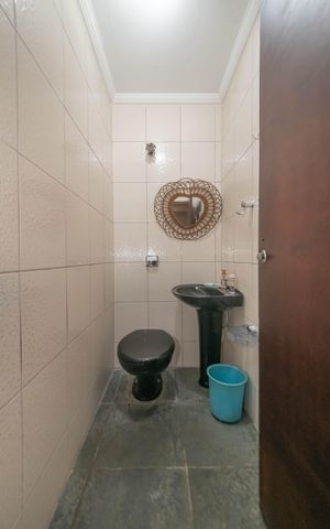 Casa à venda com 260m², 3 quartos e 9 vagasBanheiro de Serviço