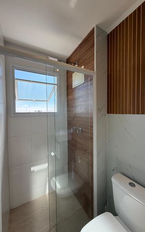Apartamento à venda com 58m², 2 quartos e 2 vagasBanheiro da Suíte