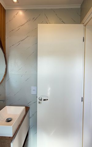 Apartamento à venda com 58m², 2 quartos e 2 vagasBanheiro da Suíte