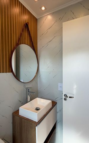 Apartamento à venda com 58m², 2 quartos e 2 vagasBanheiro da Suíte