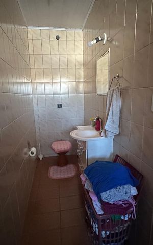 Casa à venda com 176m², 2 quartos e 2 vagas Casa à venda com 176m², 2 quartos e 2 vagasBanheiro