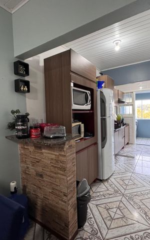 Casa à venda com 78m², 2 quartos e 2 vagas Casa à venda com 78m², 2 quartos e 2 vagasCozinha