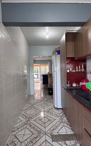 Casa à venda com 78m², 2 quartos e 2 vagas Casa à venda com 78m², 2 quartos e 2 vagasCozinha
