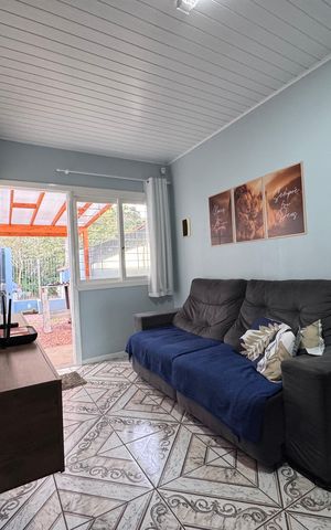 Casa à venda com 78m², 2 quartos e 2 vagas Casa à venda com 78m², 2 quartos e 2 vagasSala