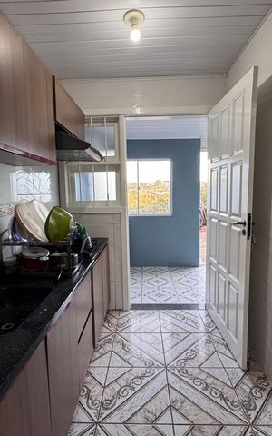 Casa à venda com 78m², 2 quartos e 2 vagas Casa à venda com 78m², 2 quartos e 2 vagasCozinha
